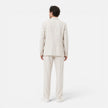Men's lightweight linen suit set by FJØRNA featuring a classic fit blazer and trousers for breathable summer style.