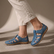 Blue FJØRNA orthopedic cutout fisherman sandals for women, featuring open toe design and supportive footbed.