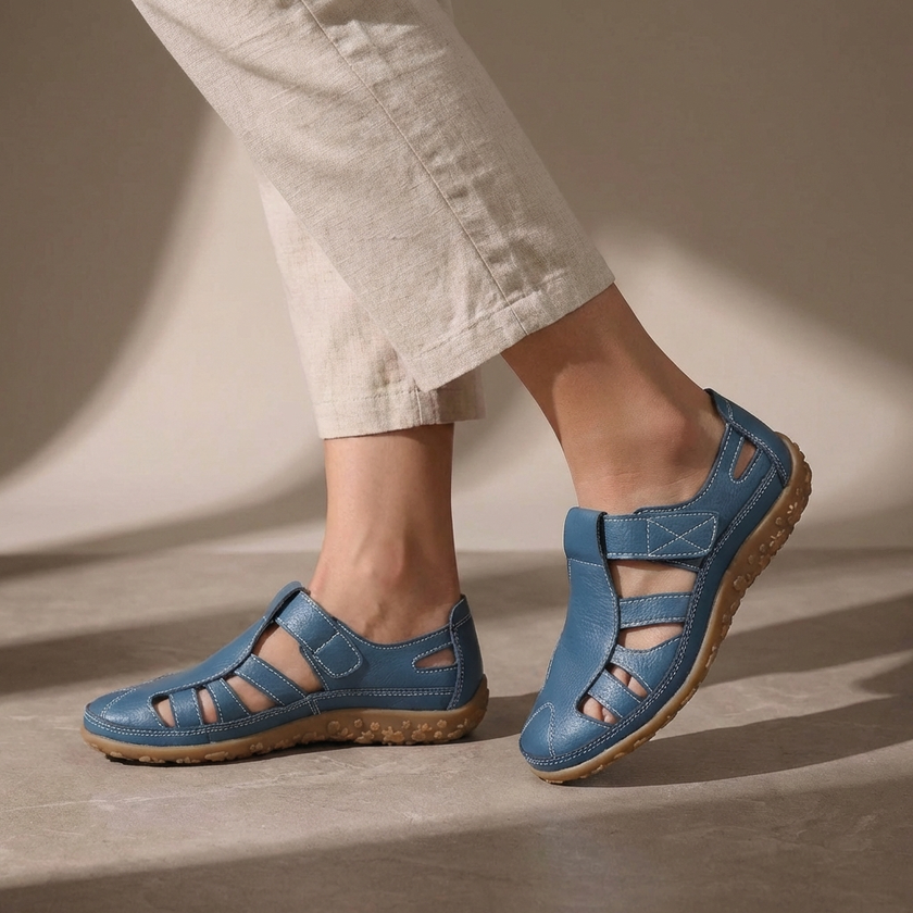 Blue FJØRNA orthopedic cutout fisherman sandals for women, featuring open toe design and supportive footbed.