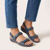 Blue FJØRNA orthopedic flat ankle strap sandals for women with adjustable fit, featuring cushioned soles and stylish design.