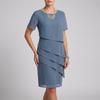 Blue elegant women's dress with ruffle chiffon design by FJØRNA, showcasing a flowing, stylish silhouette.