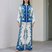 Blue floral wide-leg two-piece set for women by FJØRNA, featuring a stylish coordinated top and matching flowing pants.