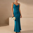 Blue FJØRNA women's elegant maxi dress with cowl neck and cami straps, flowing and stylish for formal occasions.