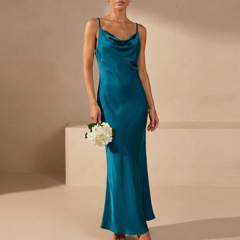Blue FJØRNA women's elegant maxi dress with cowl neck and cami straps, flowing and stylish for formal occasions.