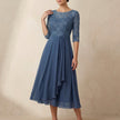 Blue FJØRNA women's elegant midi bodycon chiffon dress, showcasing a fitted design and flowing fabric.