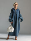 Blue denim maxi dress by FJØRNA, flowing evening dress with a relaxed fit and sleeveless design, styled for casual or elegant occasions.