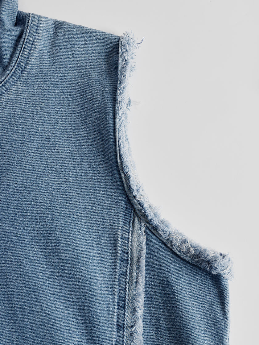 Blue denim V-neck midi dress by FJØRNA featuring a casual fit and knee-length design, with long sleeves and side pockets.
