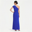 Blue women's one-shoulder maxi evening dress by FJØRNA with an asymmetric neckline, shown from the back without a slit.