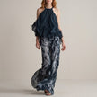 Blue FJØRNA women's two-piece print wide leg co-ord set with halter neck, featuring an elegant, stylish design.