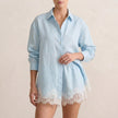 Blue FJØRNA women's lace co-ord set featuring an elegant two-piece design with a fitted top and matching skirt.