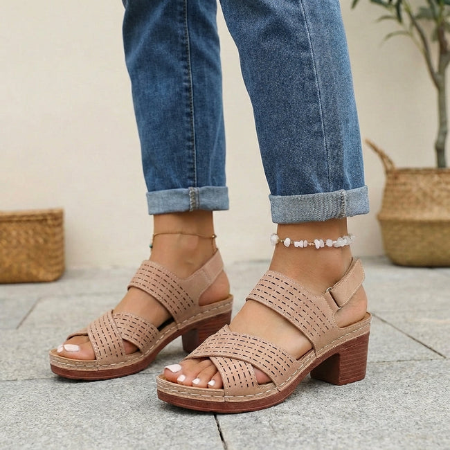 FJØRNA orthopedic platform block heel sandals in brown with open toe and cut-out design, showcasing stylish and supportive footwear.