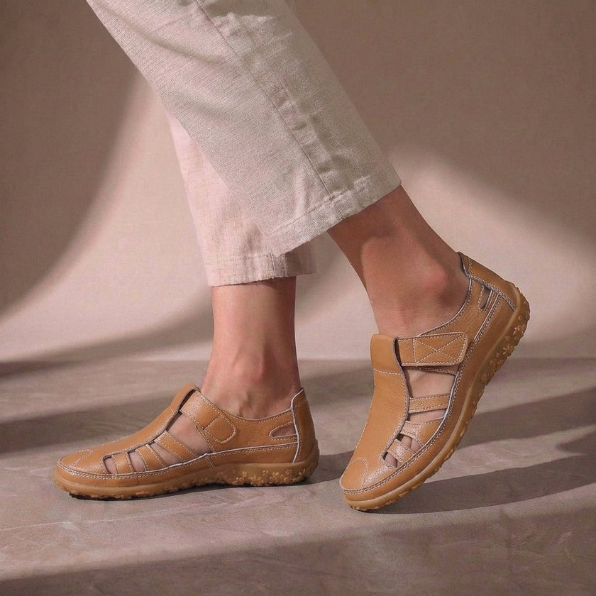 Brown FJØRNA orthopedic cutout fisherman sandals for women with open toe and adjustable straps on a white background.