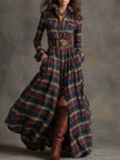 Brown FJØRNA maxi dress, casual style, flowing fabric with long sleeves and a relaxed fit, perfect for everyday wear.