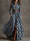 FJØRNA brown maxi casual dress with flowing fabric and sleeveless design, perfect for everyday wear.