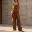 FJØRNA women's summer two-piece co-ord set in brown with pockets, casual matching outfit, featuring a crop top and shorts.
