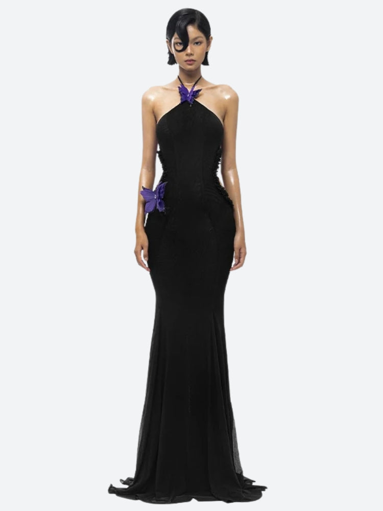 FJØRNA butterfly cut-out women's maxi dress with flowing fabric and elegant design, perfect for summer and special occasions.