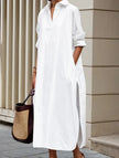 White FJØRNA casual midi dress with lapel button detail and side slit, perfect for casual wear or weddings.