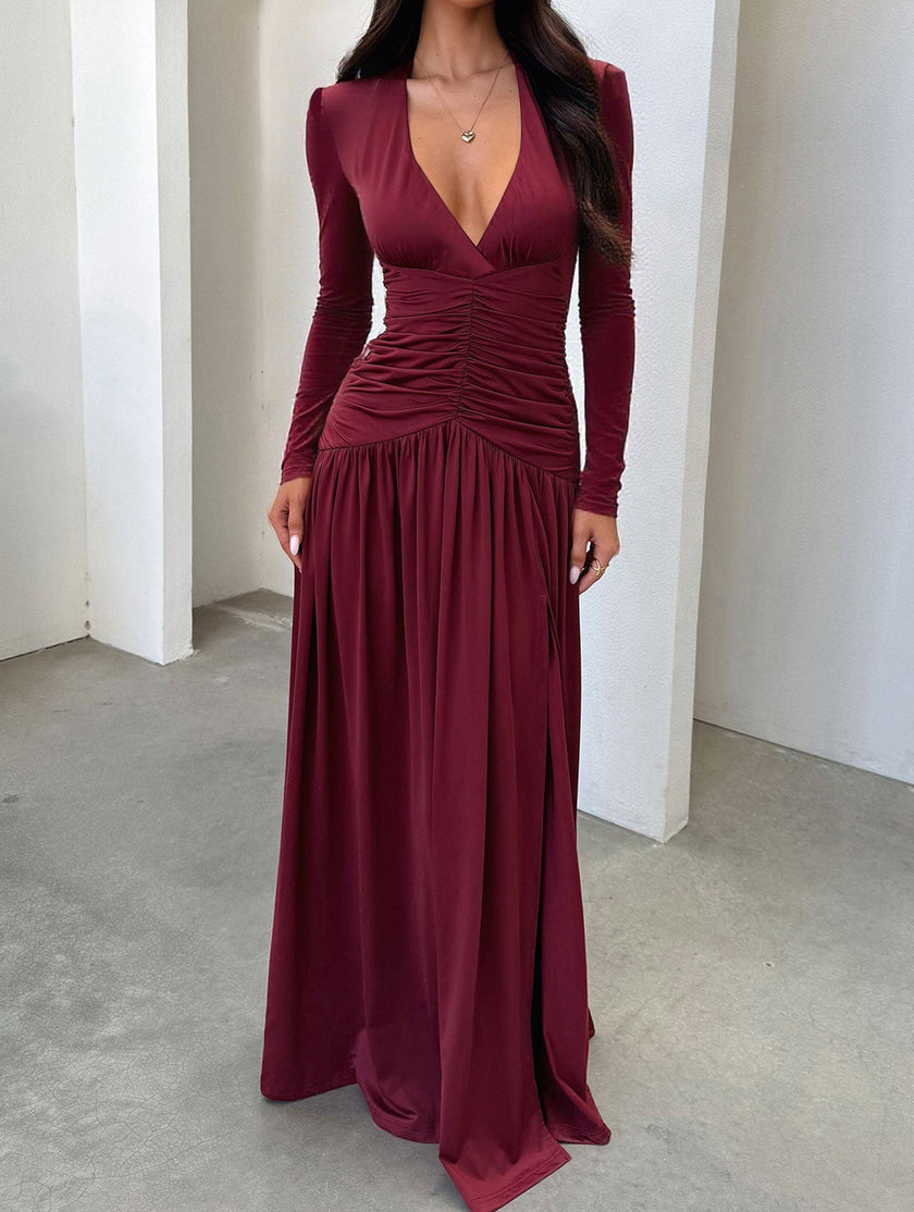 White retro deep V long sleeve maxi dress by FJØRNA, featuring a flowing silhouette and elegant design.