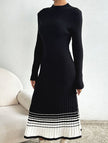 FJØRNA black and white striped pleated sweater dress, knee-length with long sleeves and a fitted silhouette.