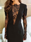 FJØRNA openwork white dress with lace slit and cinched waist, featuring intricate lace details and elegant design.