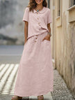 Pink FJØRNA casual loose dress for women, suitable for weddings, featuring a solid color and relaxed fit.