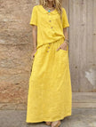 Yellow casual loose dress for women by FJØRNA, ideal for weddings or everyday wear, featuring a comfortable, relaxed fit.