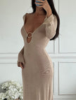FJØRNA white V-neck backless long-sleeved knit dress shown from the back, featuring a round neckline and fitted silhouette.