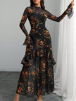 Women's white dress by FJØRNA with lotus leaf sleeves and floral print, shown from the front.