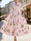 White print V-neck waist A-line dress by FJØRNA, featuring a flattering silhouette and elegant design with floral print detail.