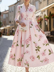 White Print V-neck waist A-line dress by FJØRNA, featuring a fitted bodice and flowing skirt, perfect for casual or summer wear.