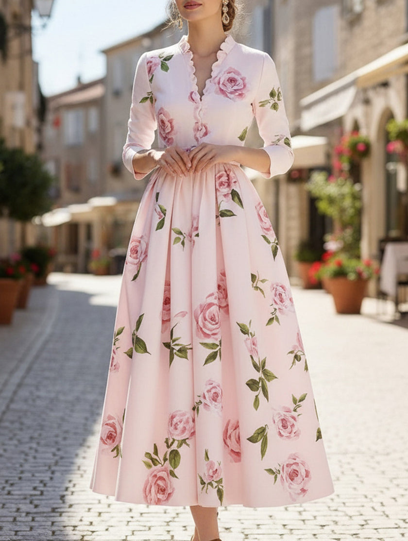 FJØRNA white V-neck waist A-line dress with a flattering silhouette, showcased on a mannequin.