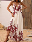 White floral print backless cami maxi dress by FJØRNA with flowing fabric and elegant design, perfect for warm weather.