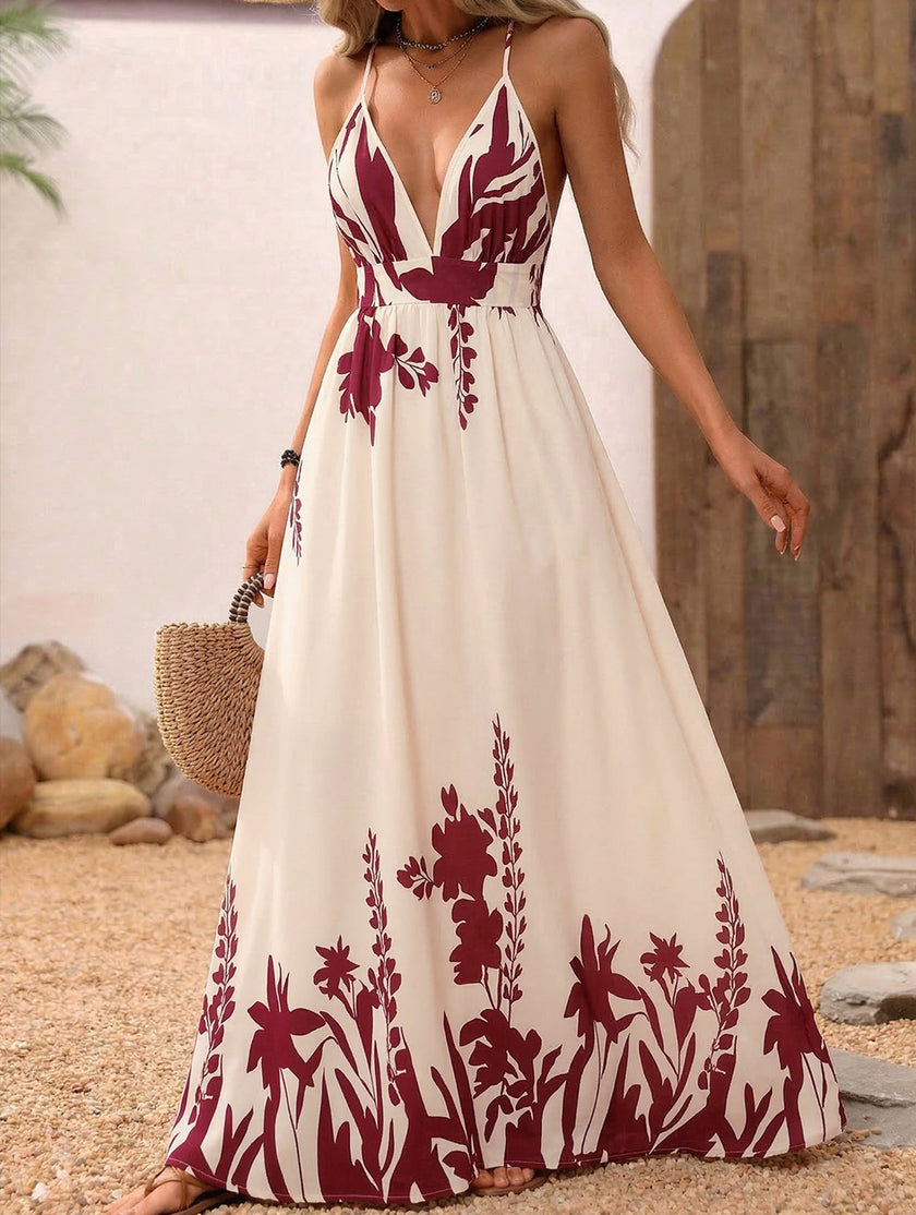 White floral print backless cami maxi dress by FJØRNA, featuring a flowing silhouette and elegant design.