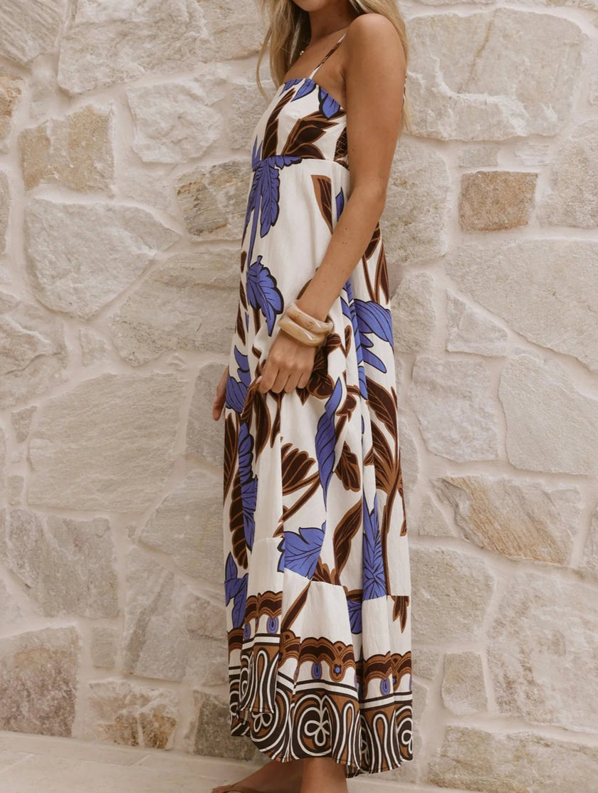 FJØRNA tropical print white cami maxi dress with colorful floral pattern, sleeveless design, lightweight fabric, perfect for summer wear.