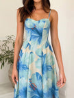 Blue floral print flowy cami maxi dress by FJØRNA with lightweight fabric and relaxed silhouette, perfect for summer wear.