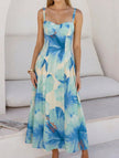 FJØRNA floral print flowy cami maxi dress in white, featuring a lightweight, elegant design with a vibrant floral pattern.
