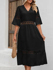 FJØRNA white v-neck hollow short sleeve dress, casual elegant design, sleeveless with a fitted waist and flowing skirt.