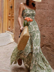 White FJØRNA Cami Slim Fit Maxi Dress with adjustable straps, flowing fabric, and elegant design perfect for summer wear.