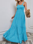 Blue retro striped maxi dress by FJØRNA featuring a flowing silhouette and classic pattern, perfect for casual or summer wear.