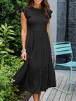 Black solid color cross-border sleeved dress by FJØRNA, featuring a stylish design and long sleeves.