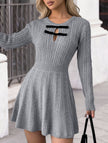 Grey textured knit fitted dress by FJØRNA, perfect for wedding guests, showcasing a stylish and comfortable silhouette.