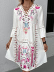 White V neck lace patch print dress by FJØRNA featuring a stylish design and elegant fabric, perfect for casual or semi-formal wear.