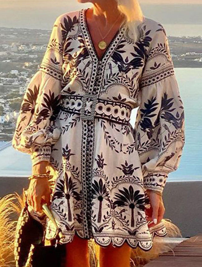 FJØRNA printed beach mini dress in white, lightweight fabric with a relaxed fit, perfect for summer beach outings.