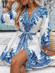 FJØRNA blue tie waist print midi dress with a relaxed fit and elegant design, perfect for casual or semi-formal occasions.