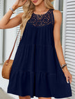 White lace patch halter A-line dress by FJØRNA, showing the elegant neckline and flowy skirt design.