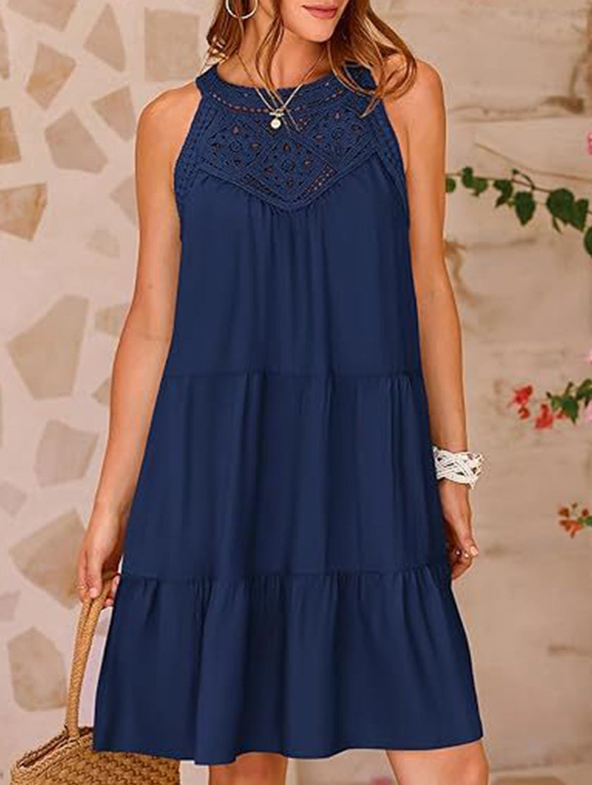 White lace patch halter A-line dress by FJØRNA, shown with its elegant design and flowing silhouette.