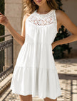 White lace patch halter A-line dress by FJØRNA, featuring a fitted bodice and flowing skirt, perfect for elegant occasions.