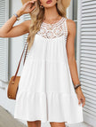 White lace patch halter A-line dress by FJØRNA, featuring a fitted bodice and flowing skirt, perfect for elegant occasions.
