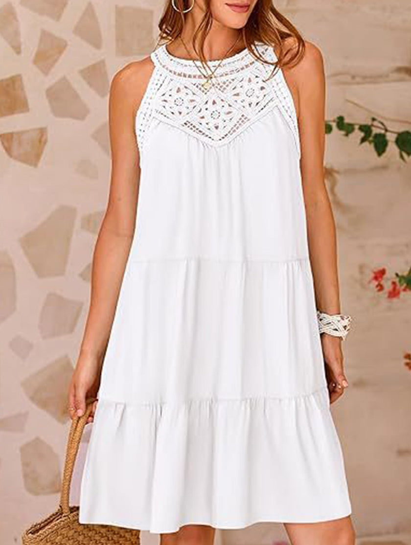 White lace patch halter A-line dress by FJØRNA, featuring delicate lace details and a flattering flowy silhouette.