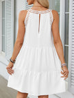 White lace patch halter A-line dress by FJØRNA, featuring a fitted bodice and flowing skirt, perfect for elegant occasions.